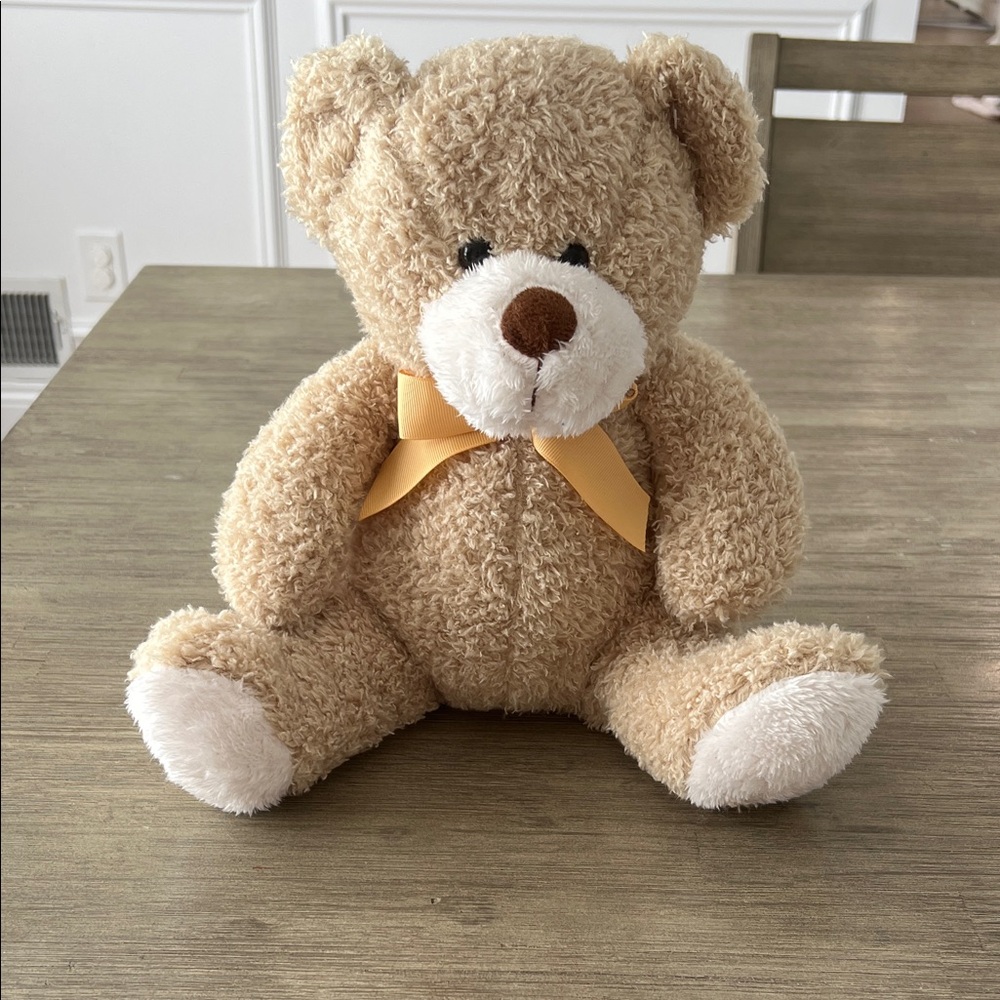 Plush Teddy Bear with Yellow Bow